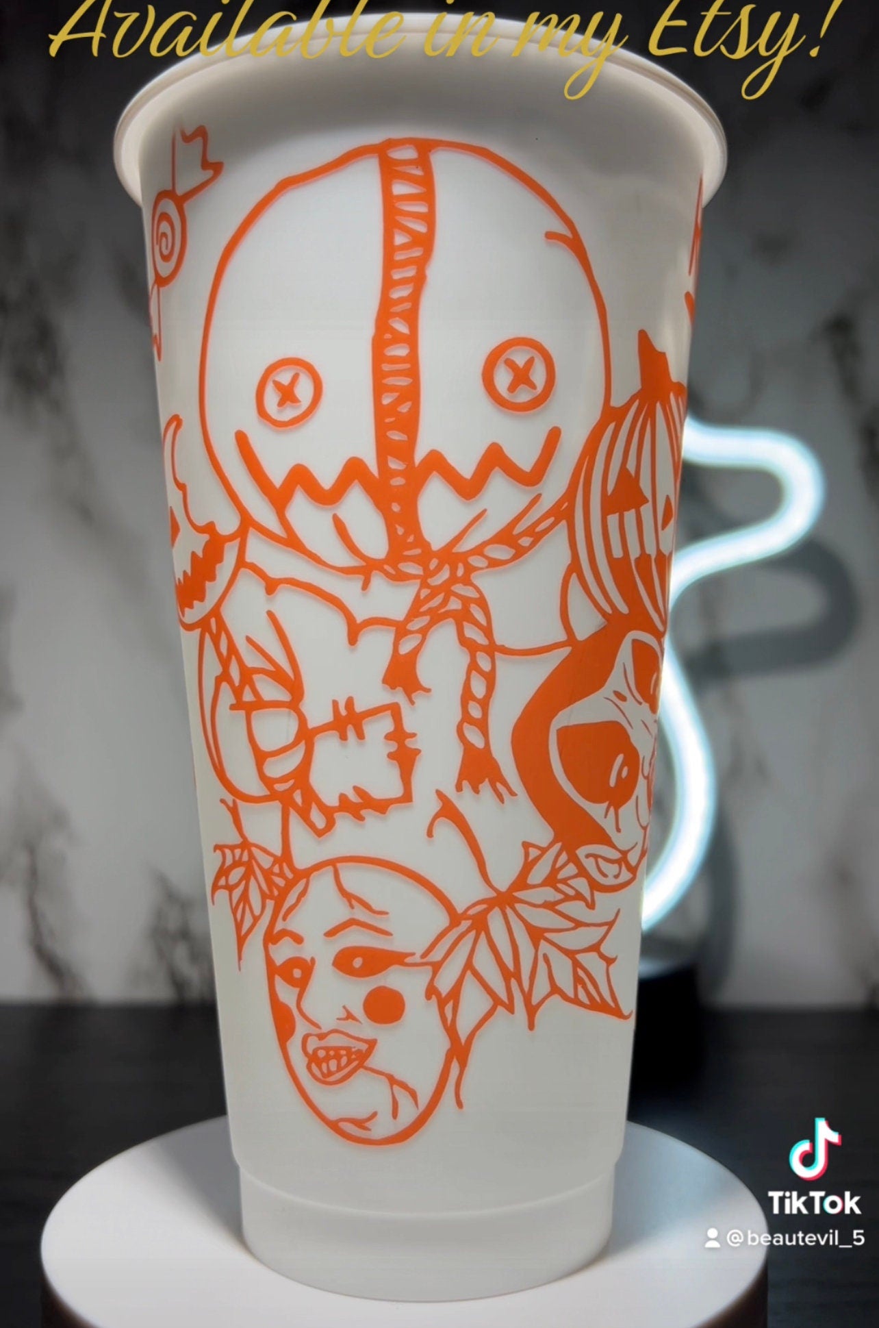 Sam w/masks Trick R Treat Design 2 Color changing permanent vinyl on a white cold cup