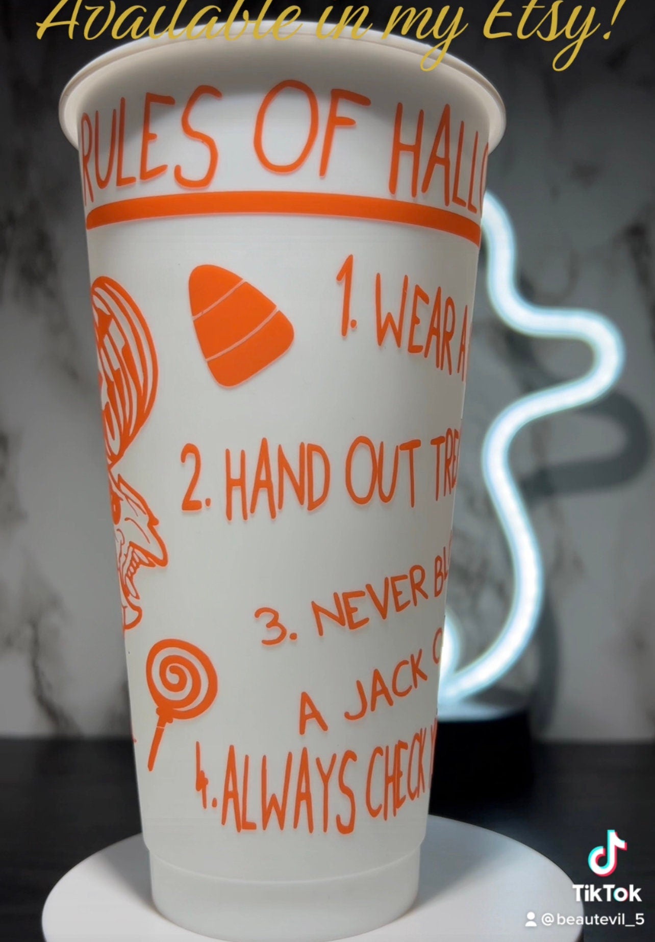 Sam w/masks Trick R Treat Design 2 Color changing permanent vinyl on a white cold cup