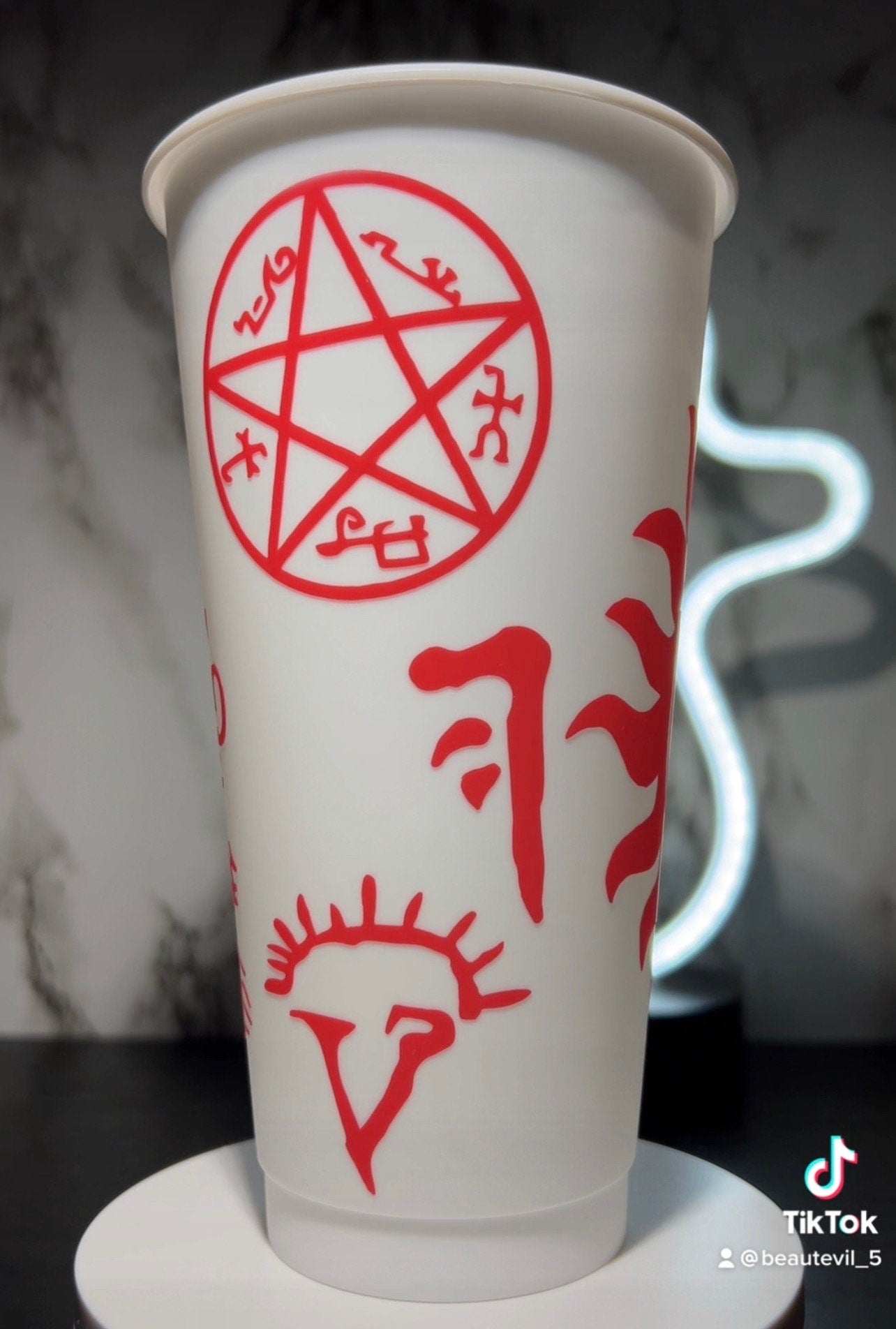 All Red Supernatural sigils color changing permanent vinyl on a white cold cup