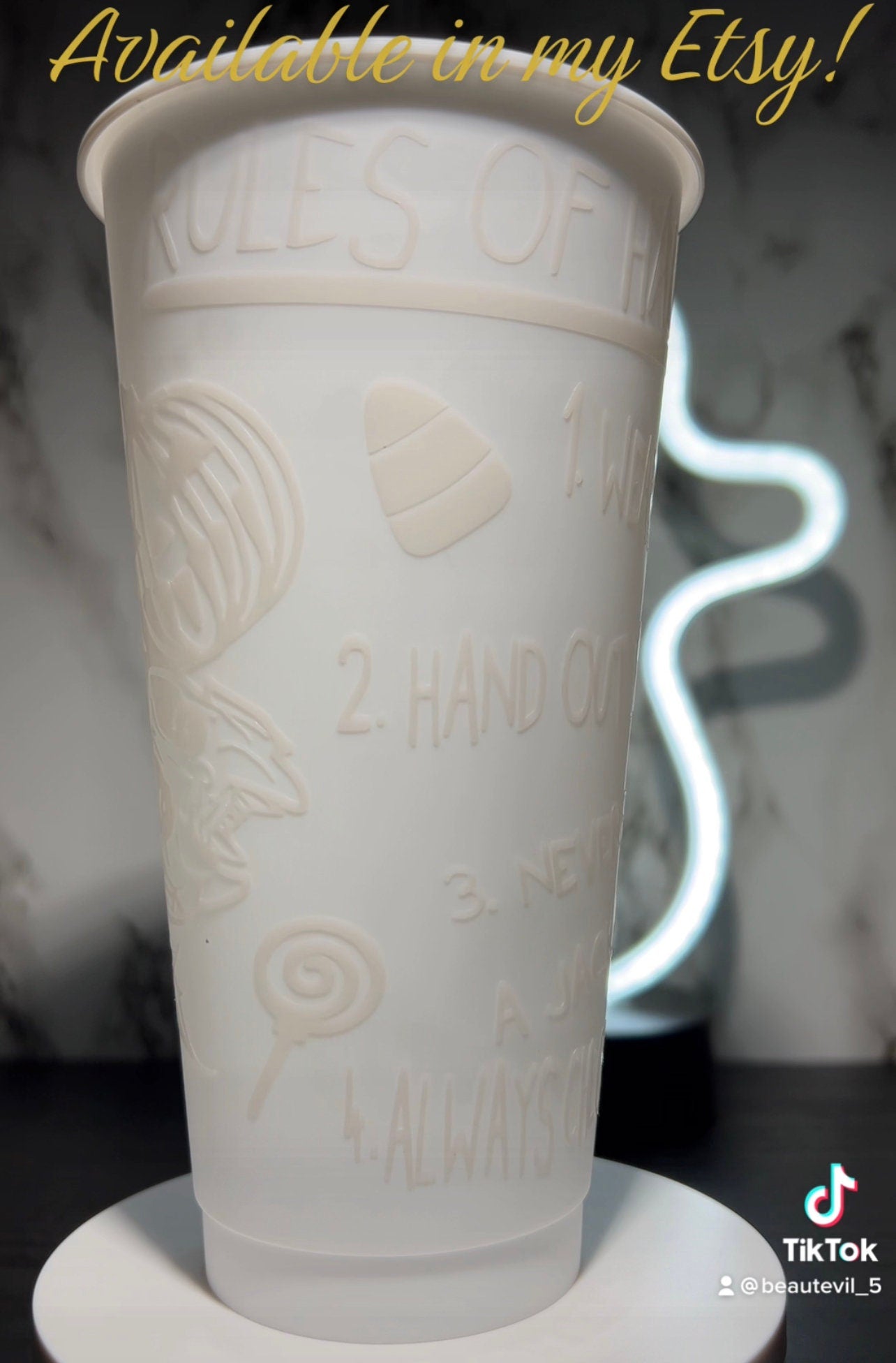 Sam w/masks Trick R Treat Design 2 Color changing permanent vinyl on a white cold cup