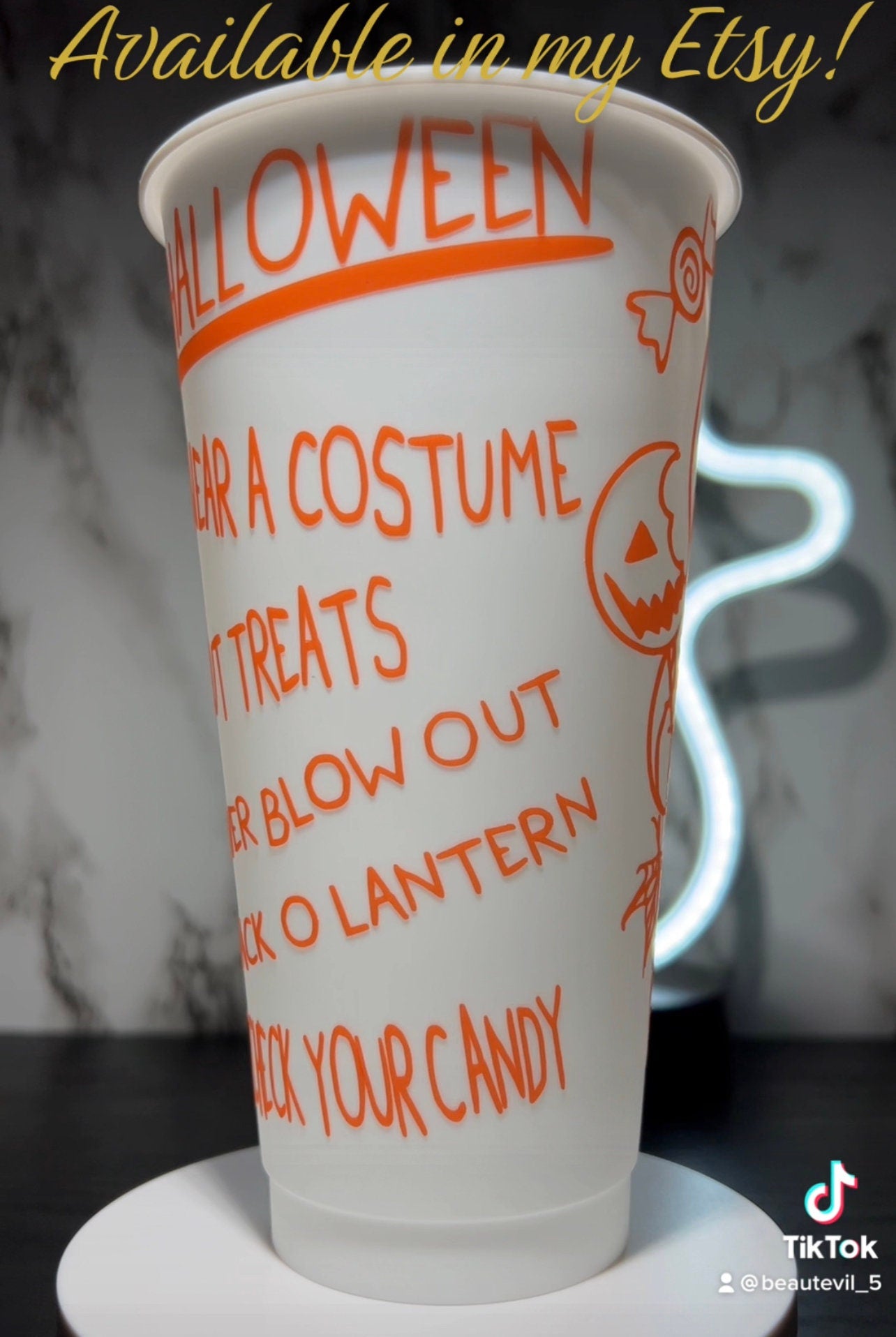Sam w/masks Trick R Treat Design 2 Color changing permanent vinyl on a white cold cup