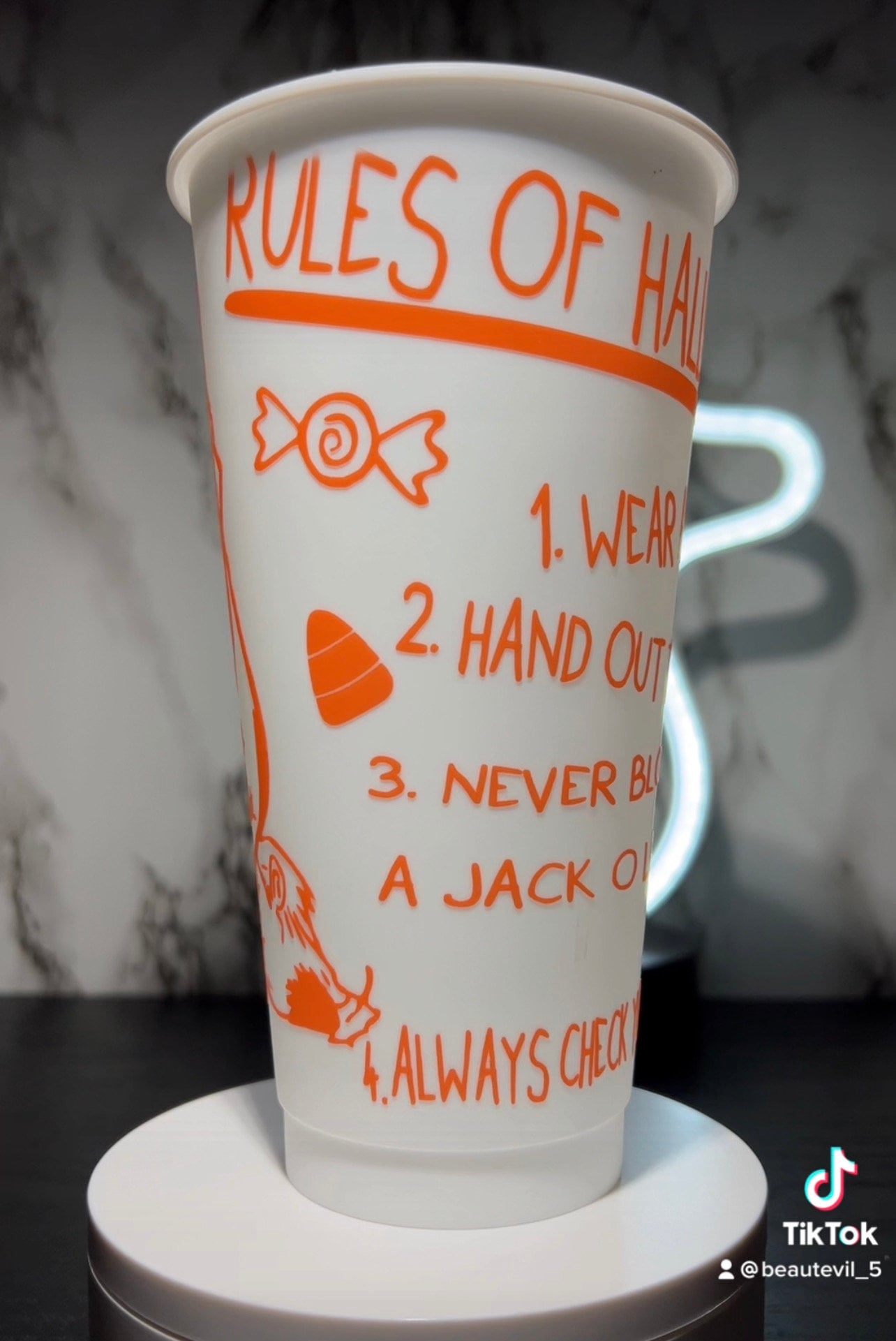 Sam w/bag  Trick R Treat Design 1 Color changing permanent vinyl on a white cold cup