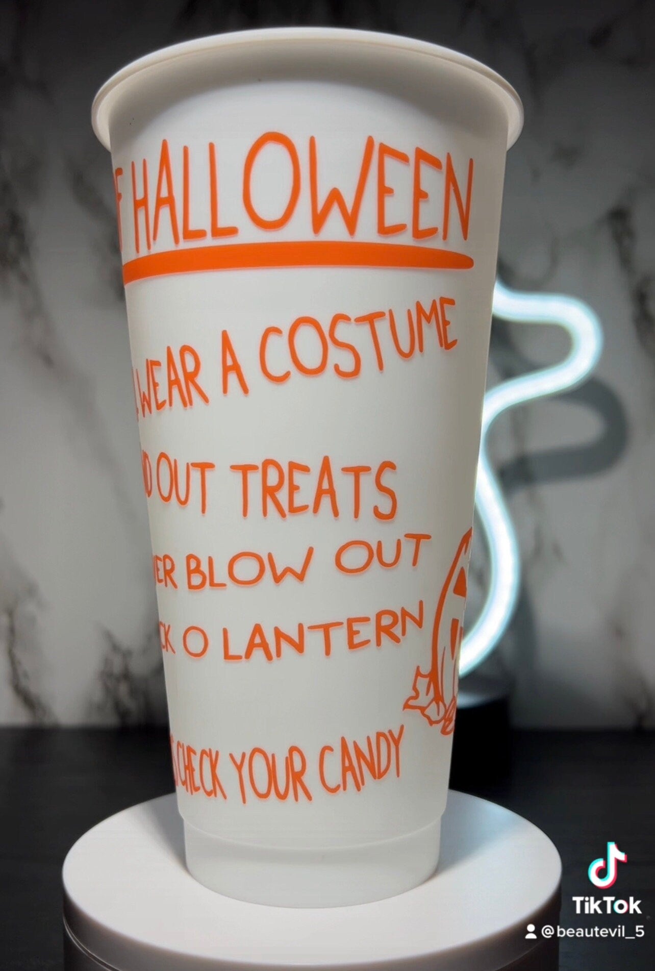 Sam w/bag  Trick R Treat Design 1 Color changing permanent vinyl on a white cold cup