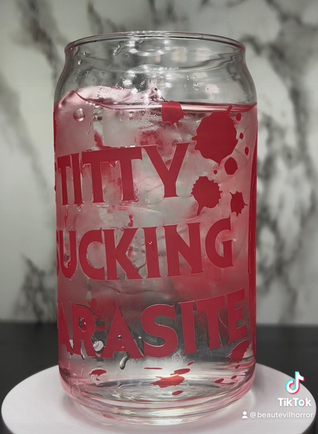Evil Dead Rise Titty Sucking Parasite Bloody Cheese Grater color changing permanent vinyl on a libbey beer can glass