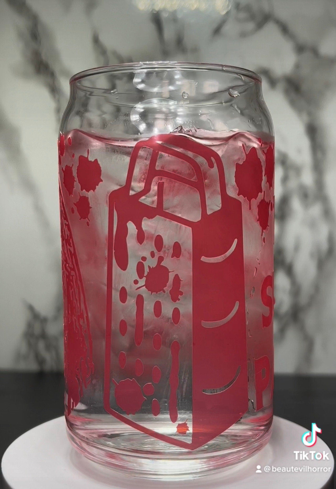 Evil Dead Rise Titty Sucking Parasite Bloody Cheese Grater color changing permanent vinyl on a libbey beer can glass