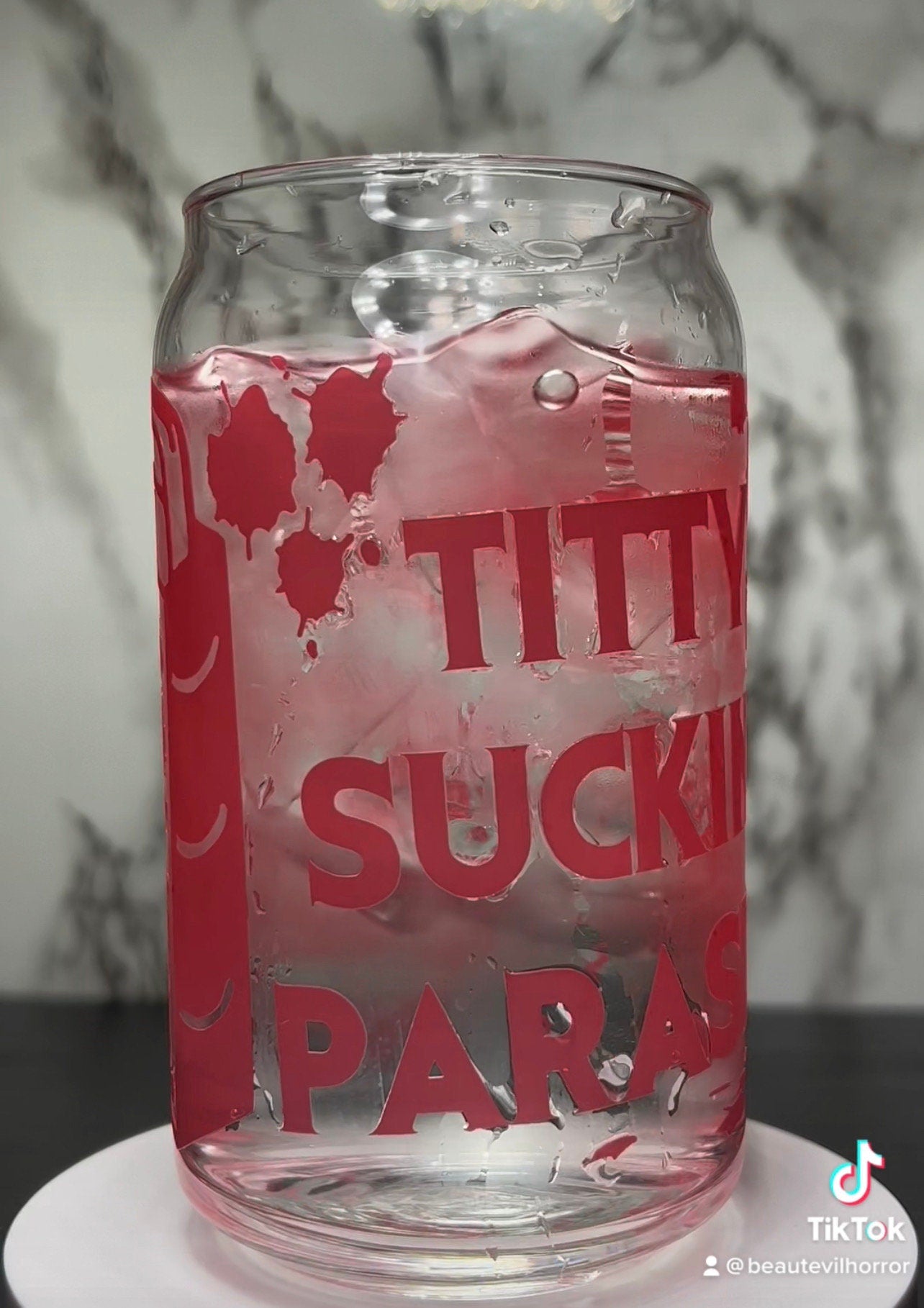 Evil Dead Rise Titty Sucking Parasite Bloody Cheese Grater color changing permanent vinyl on a libbey beer can glass