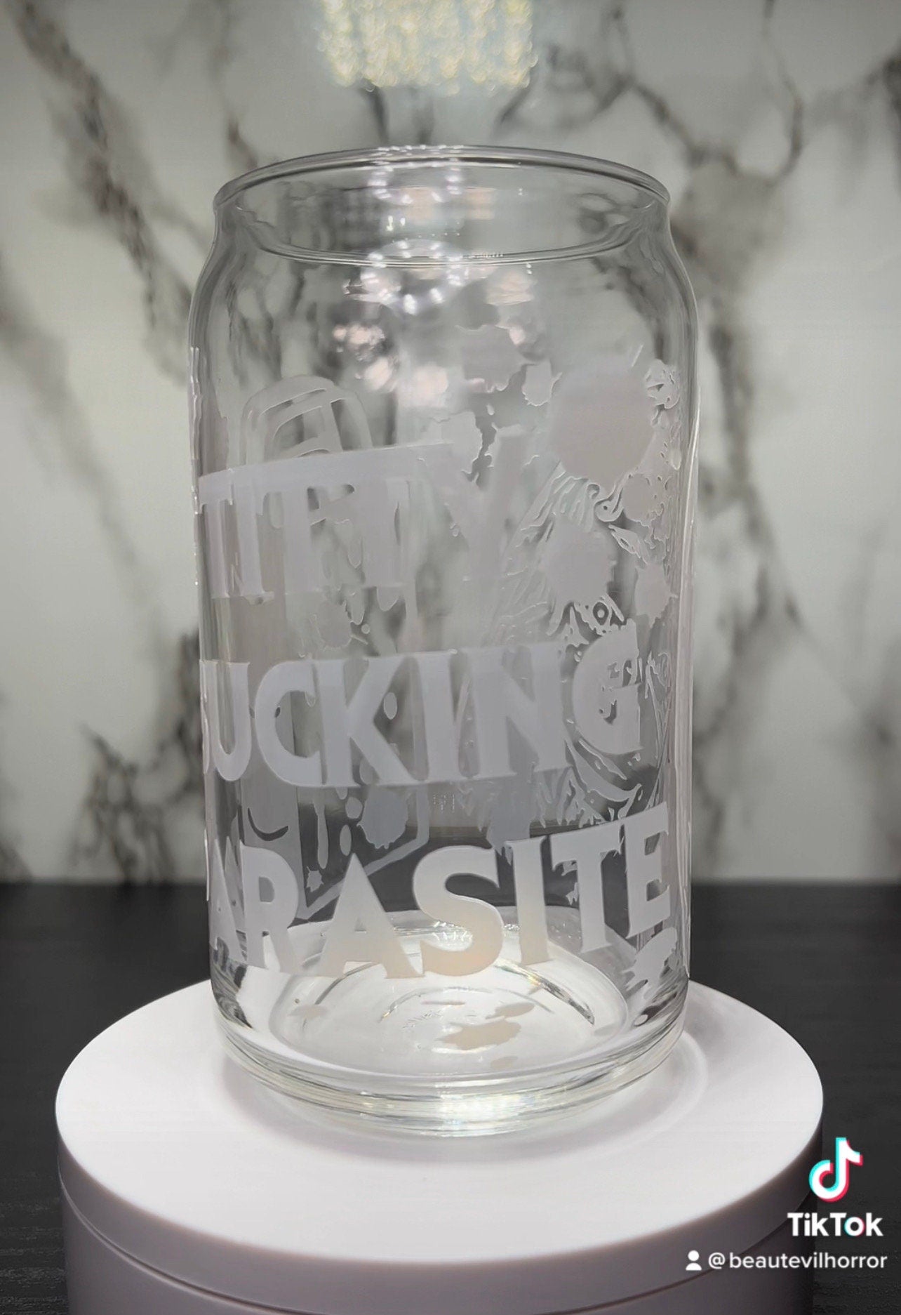 Evil Dead Rise Titty Sucking Parasite Bloody Cheese Grater color changing permanent vinyl on a libbey beer can glass