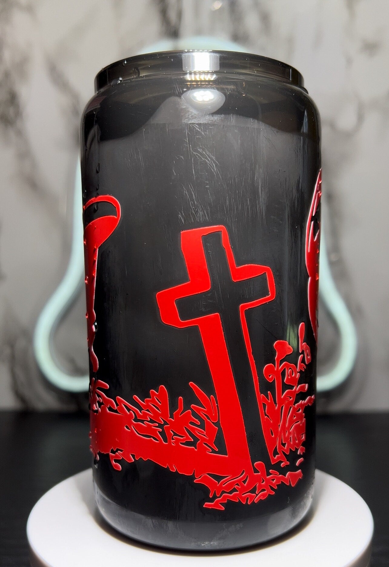 Saltburn color changing permanent vinyl on a all black beer can glass