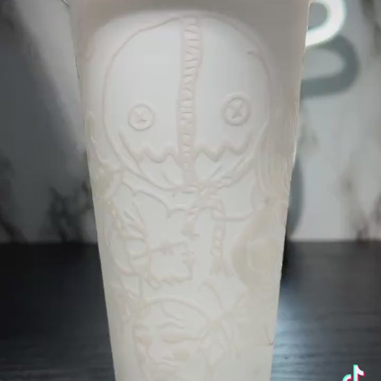 Sam w/masks Trick R Treat Design 2 Color changing permanent vinyl on a white cold cup