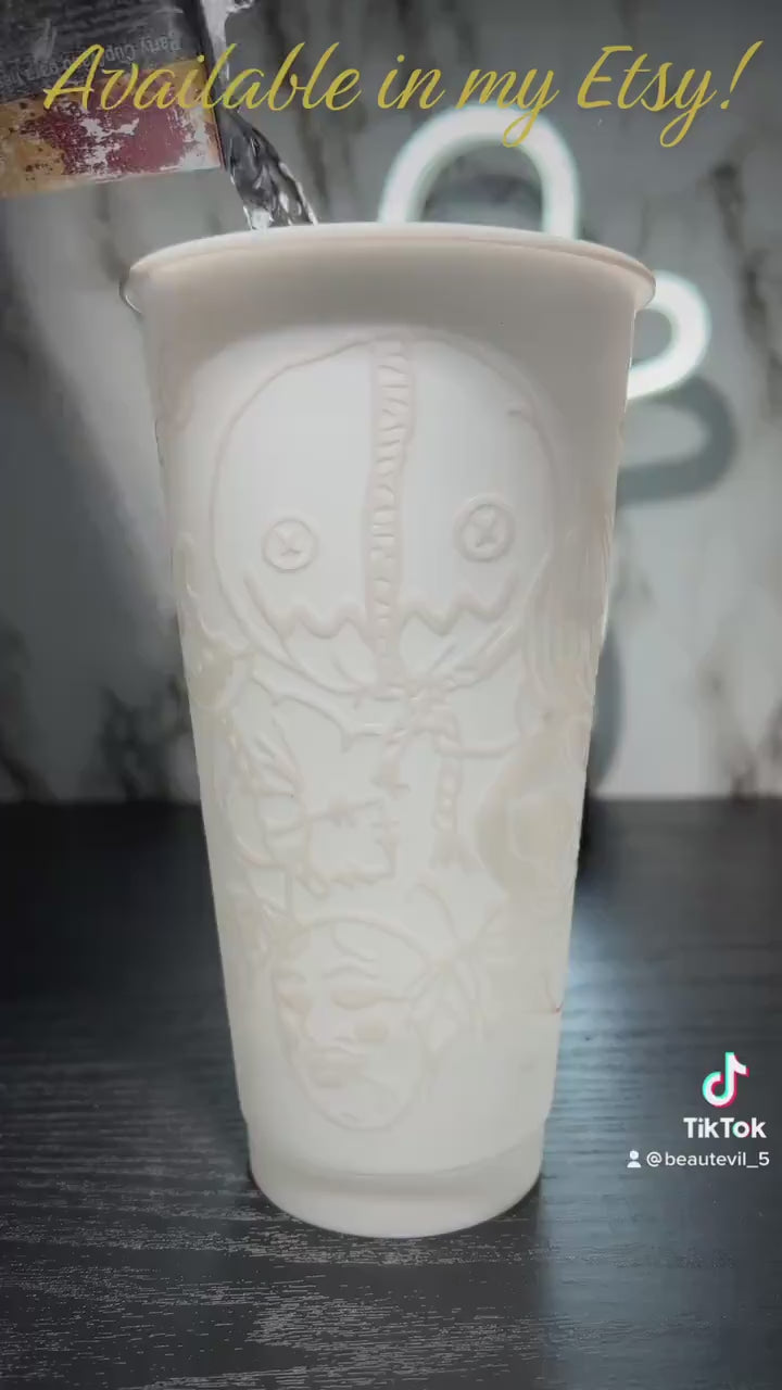 Sam w/masks Trick R Treat Design 2 Color changing permanent vinyl on a white cold cup