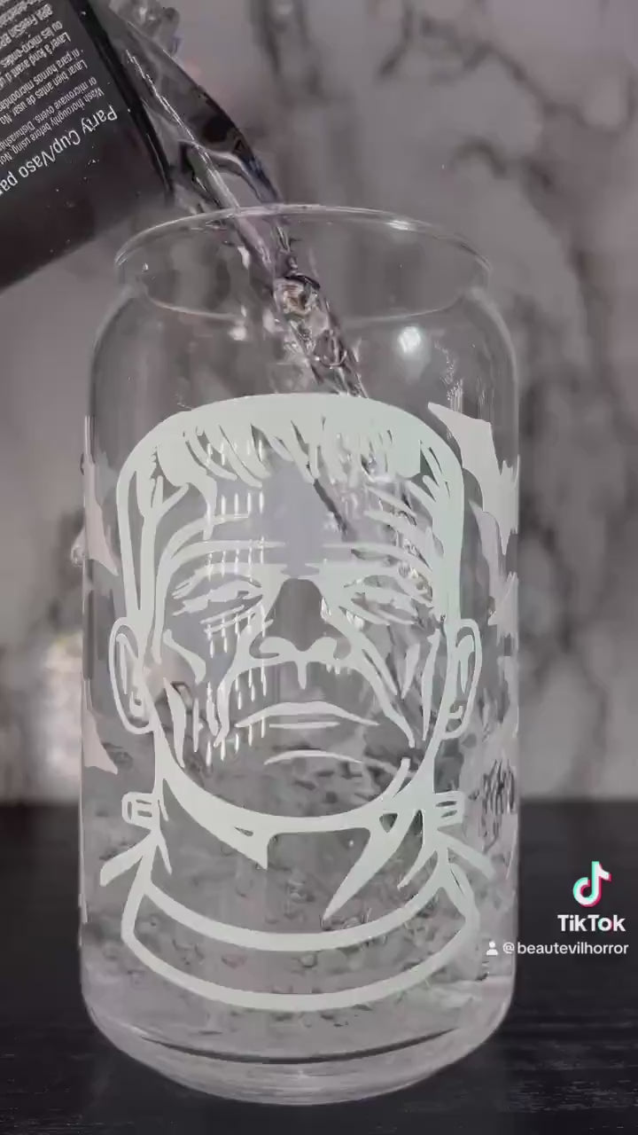 Frankenstein & Bride of Frankenstein cold color changing permanent vinyl on a libbey beer can glass.
